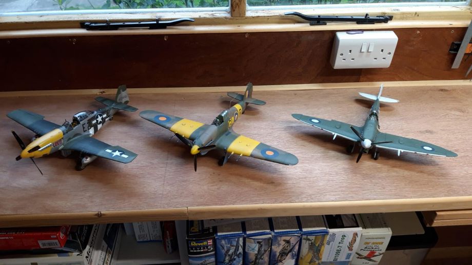 Co-founder Dave Foxall has evidently been busy during the lockdown.  From left to right (all 1/32 scale) are a P-51D-5 USAAF (Revell), a Hurricane MkIIc SAAF (Fly) and a Spitfire Vc RAAF (Revell Mk II and Mk IX combined).  Dave has airbrushed most of the markings, if you are wondering where you could get 'decals to do that'!  July 2020