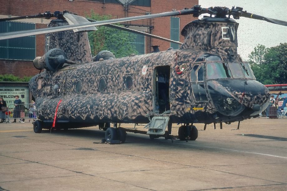 Chinook HC.1 ZA707 ‘EV’ of 7 Squadron in its ‘pink and black squiggle’ camouflage at RAF Mildenhall in May 1991.  This ‘dumbing down’ of the pink was apparently achieved with a paint roller and found necessary for nocturnal operations as the ARTF finish tended to be quite reflective.  Photo © D. Draycott.