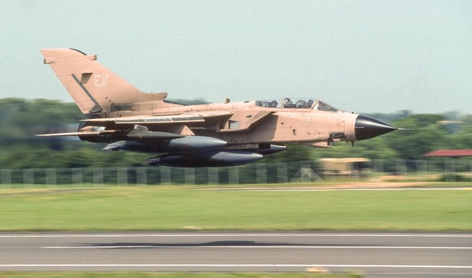 Tornado GR.1T ZA410 ‘EX’ was the first of nine ‘twin stick’ aircraft modified to act as buddy tankers which in the event were not used and kept in reserve.  It is seen here looking rather pristine at Fairford in July 1991.  Photo © D. Draycott.