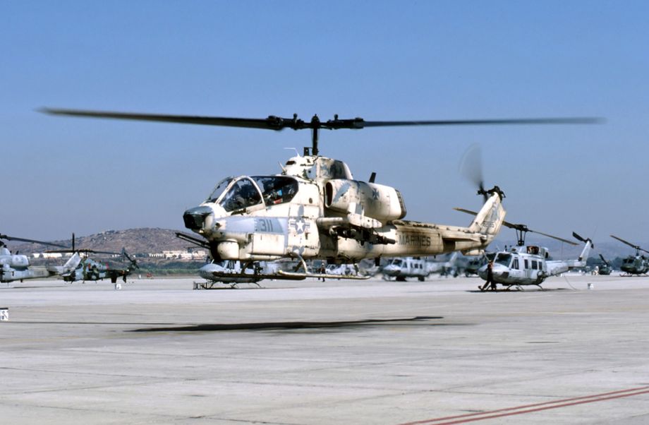 Here AH-1W 162555/SN/311 returns to the ramp at Camp Pendleton with a wonderfully weathered sand camouflage scheme. It was whilst we were with this unit that our guide told us that, as they were rushing to deploy, they ran out of suitable sand coloured paints and supplies were procured from a local Walmart Store! This may have been a leg pull for Brit visitors but whatever you believe it is a wonderful opportunity for some deft weathering. (Note this is the opposite side of the same helicopter on the previous photo and thus a highly useful reference for modellers).  Photo © M. Hopper.