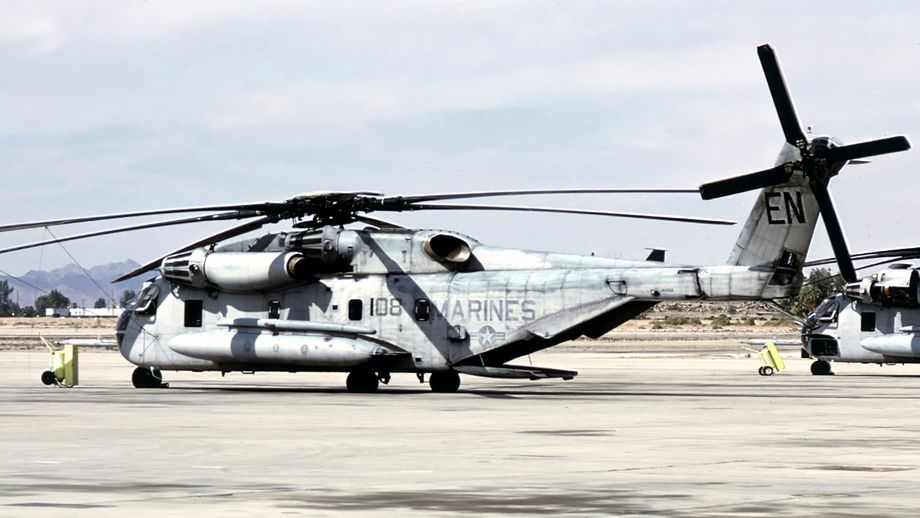 CH-53E 162522/EN/108 of HMH-464 “Condors” from MCAS New River was seen here at MCAS Yuma. HMH-464 provided eight CH-53Es to MAG-26. The Condors played a key role in providing support to the list Marine Division as it prepared to liberate Kuwait. The Condors flew 304 combat sorties during Operation Desert Storm, delivering 2,167,150 pounds of cargo and transporting 1,686 passengers.  Photo © M. Hopper.