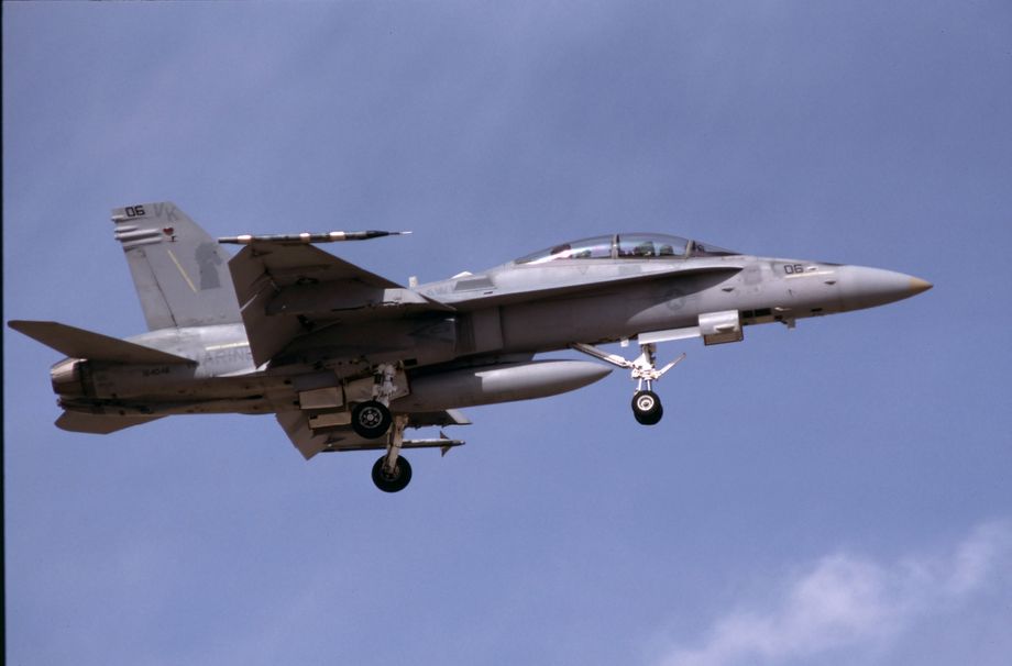 VMFA(AW)-121 “Green Knights” was the first Marine Corps F/A-18D night attack squadron. Just over a year after their transition to the Hornet the “Green Knights” deployed to the Gulf.  During the Desert Storm air campaign, the squadron flew 557 sorties, many of them Forward Air Controller (FAC) sorties, operating with USMC as well as coalition packages. Home based at MCAS El Toro, F/A-18D 164046/VK/06 was seen here at MCAS Yuma in October 1991.  Photo © M. Hopper.